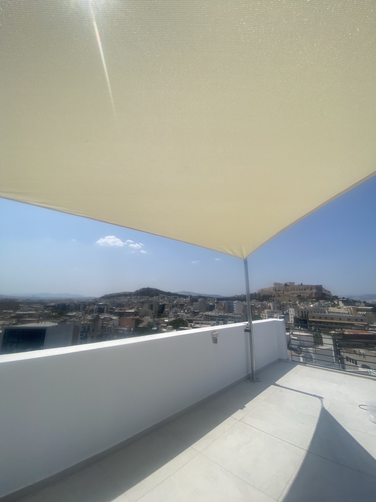 Σύστημα σκίασης με εφελκυόμενη κατασκευή, Μετς, Αθήνα — φωτογραφία 1 από 3